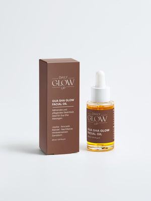Daily Glow Up Gua Sha Glow Facial Oil mit hochwertiger Verpackung.